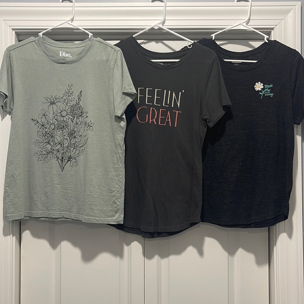 Group of three women’s size small T-shirts all in good condition.